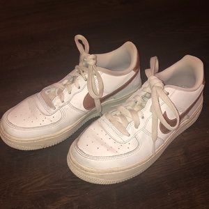 Nike Air Force 1 with rose gold swoosh